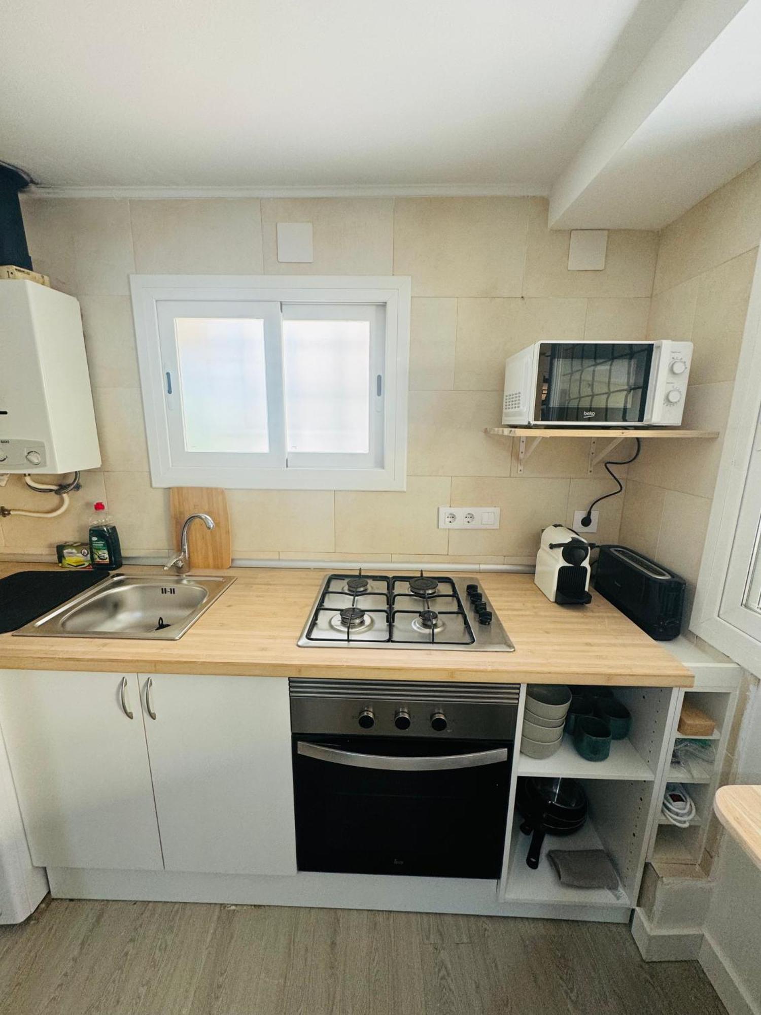Piso Con Jardin, De Playa Fenals Apartment