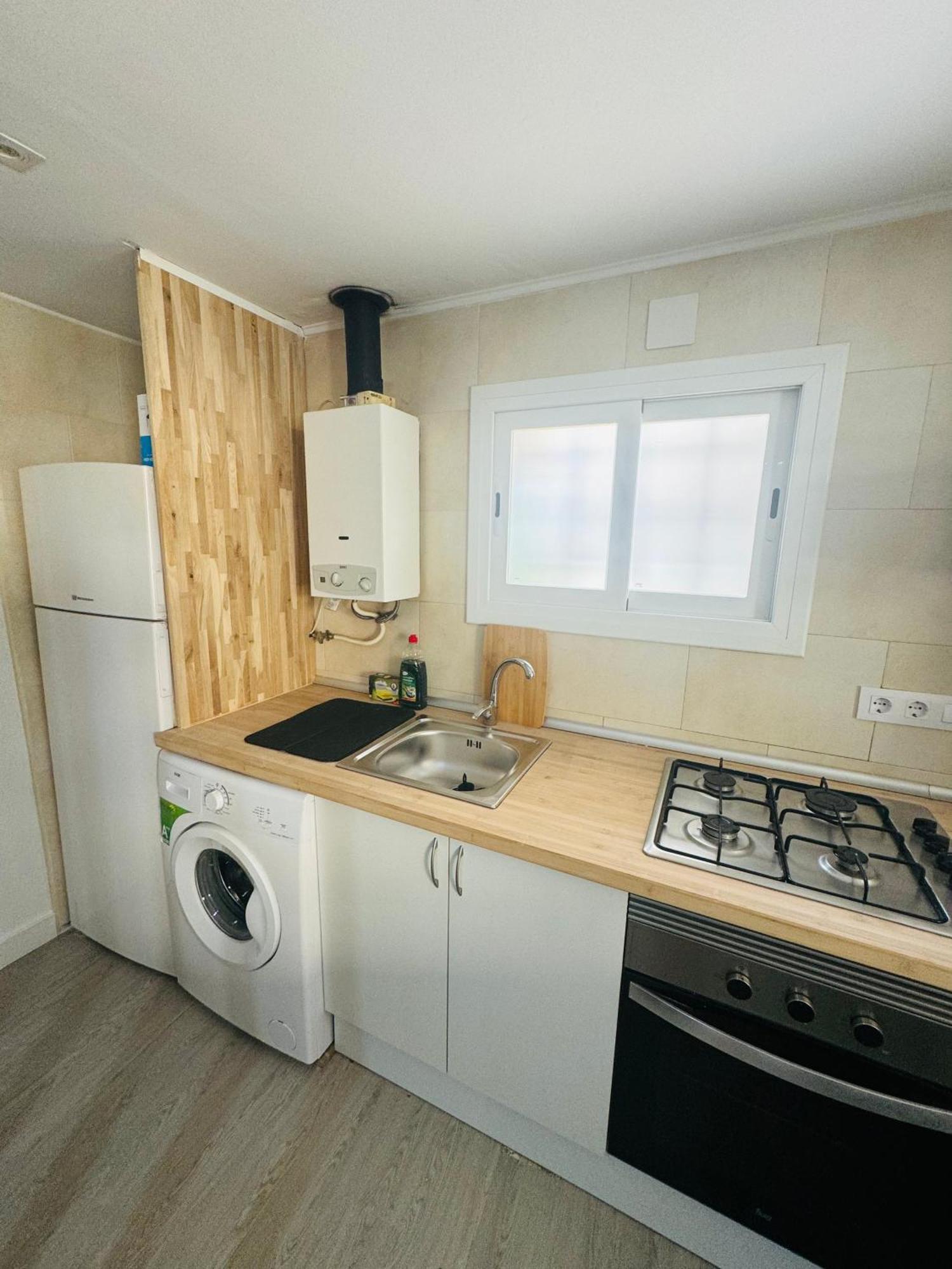 Piso Con Jardin, De Playa Fenals Apartment *