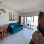 Bonito apartamento con vistas al mar y piscina