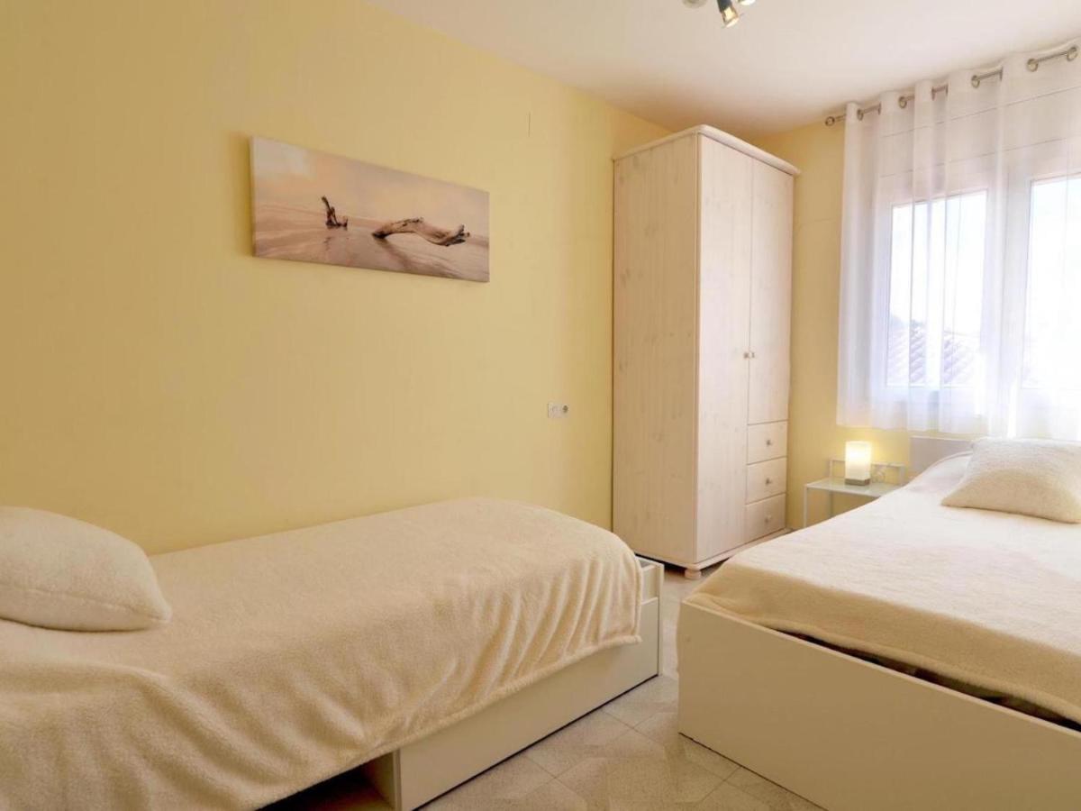 Сasa de vacaciones Gerkens, Bonita Casa De Tres Con Piscina Comunitaria En Escala L' Escala